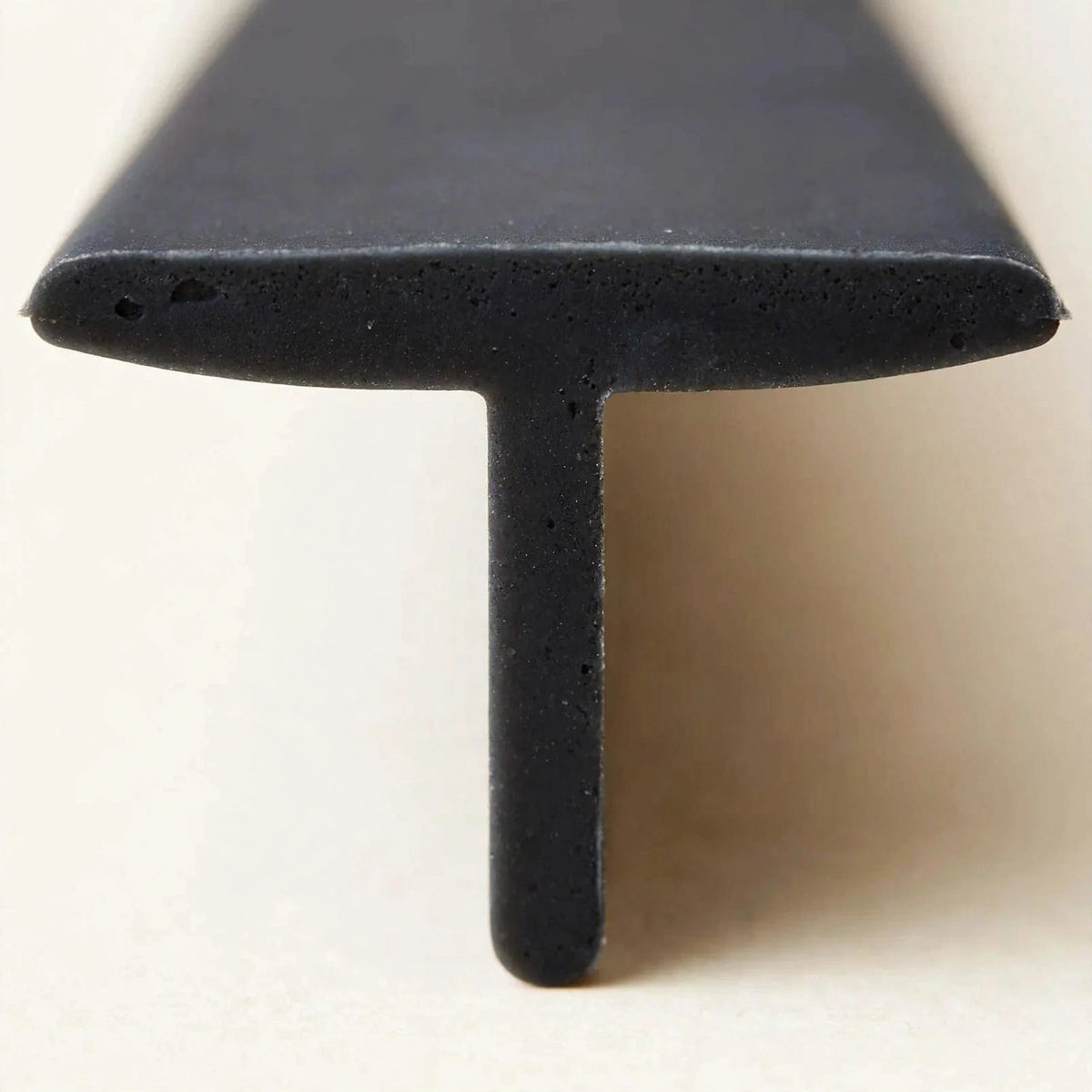 Black silicone stove gap cover T-profile close-up