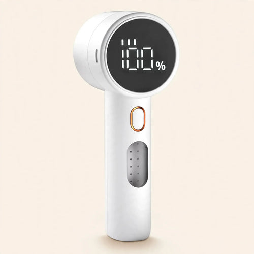 White rechargeable fabric shaver with LED battery display — studio hero shot
