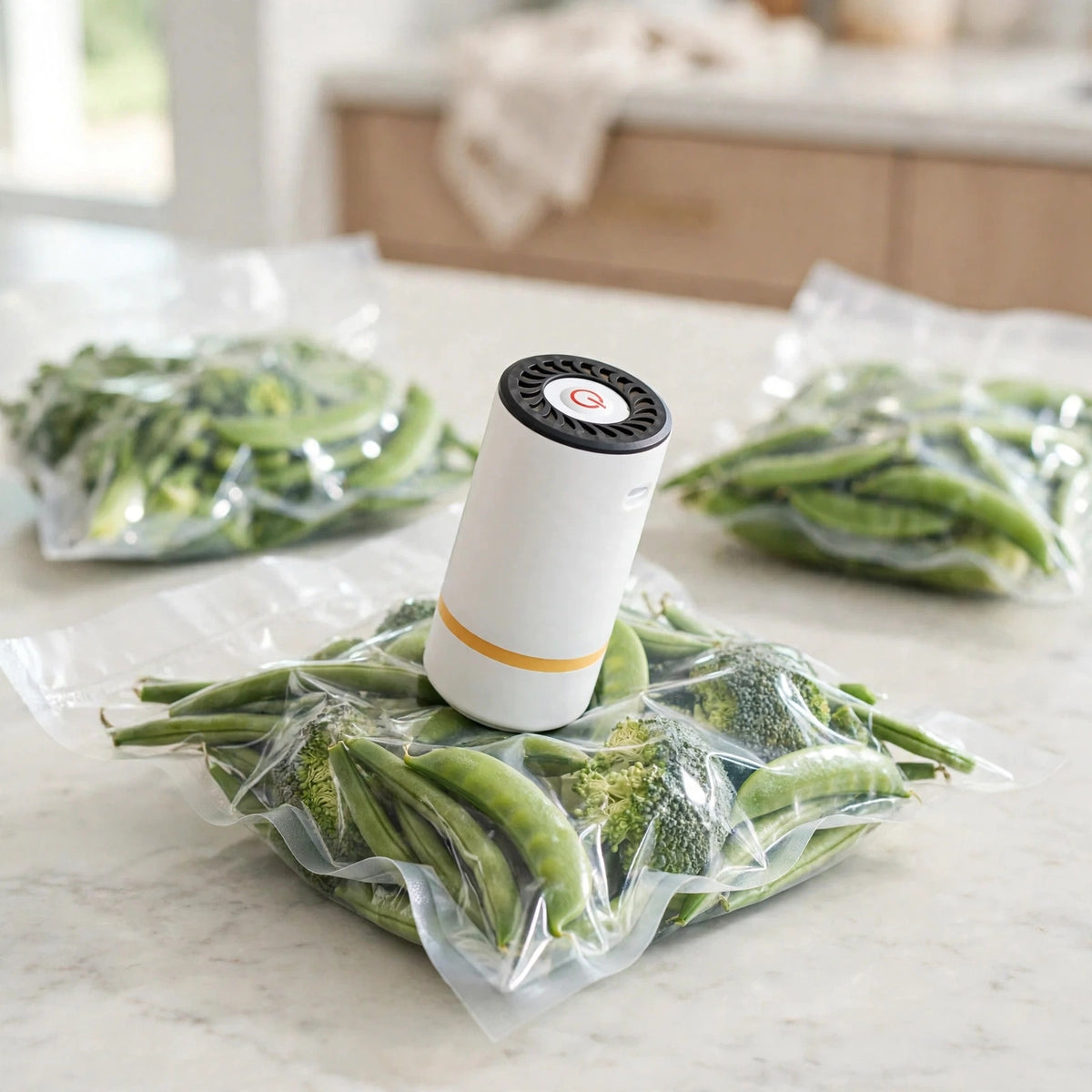 Vacuum pump sealing a bag of fresh vegetables on a kitchen counter